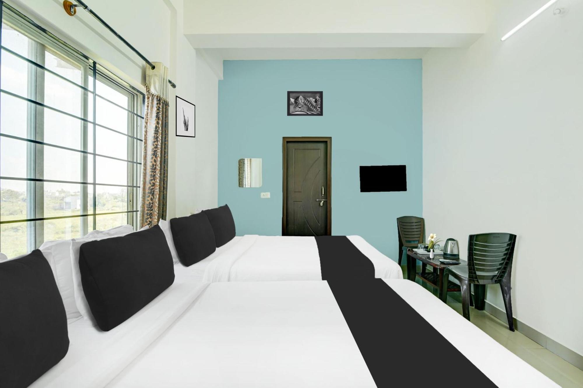 Hotel Super Collection O Chikmangaluru Near Railway Station à Chikmagalūr Extérieur photo